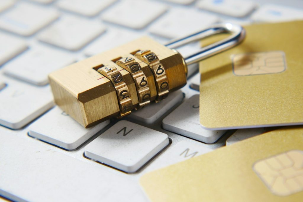 A golden padlock on a keyboard, illustrating account access security