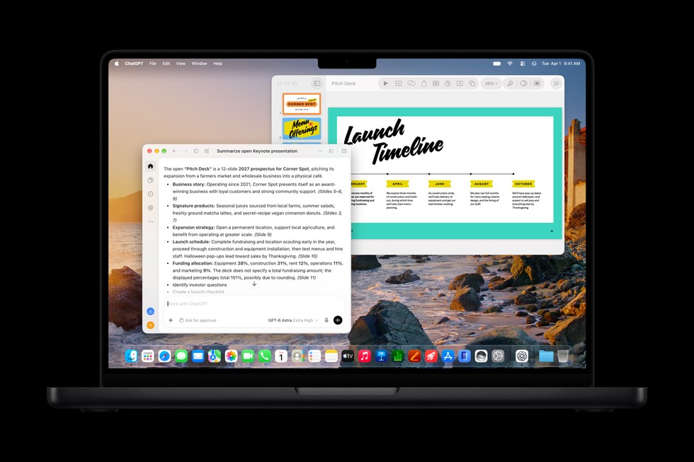 Apple press image of a MacBook Pro showing a Keynote pitch deck and an assistant-generated summary.