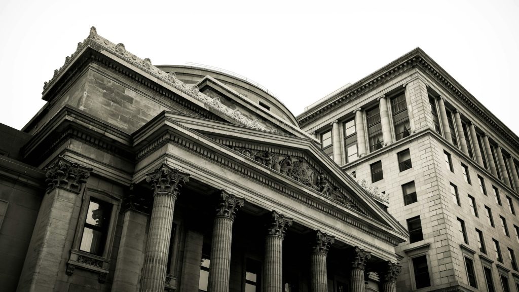Stone columns on a bank building, used as an illustrative photograph